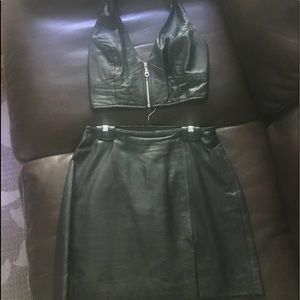 Strapless leather blouses and leather mi skirt